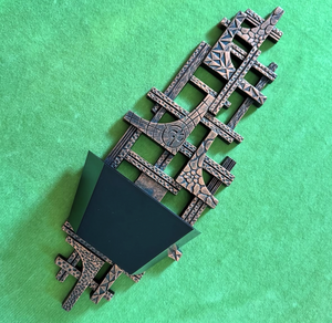 MCM brutalist wall hanging planter.