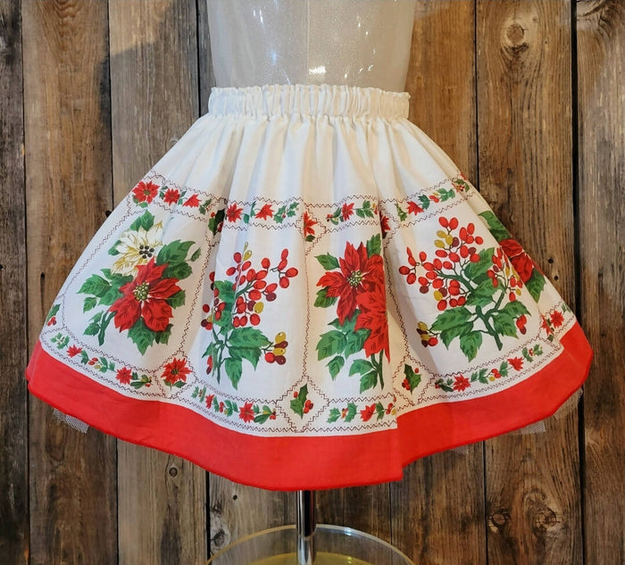Poinsettia Border Print Skirt. Size 5-7 years