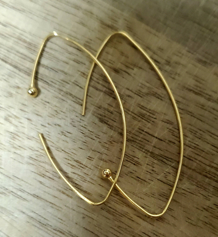 Gold stella earrings