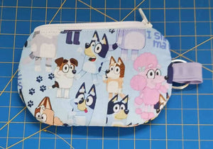 Zippered Coin Purse Ear Bud Holder - Blue Background With Cartoon Dogs - Drinkle Mall Location Only