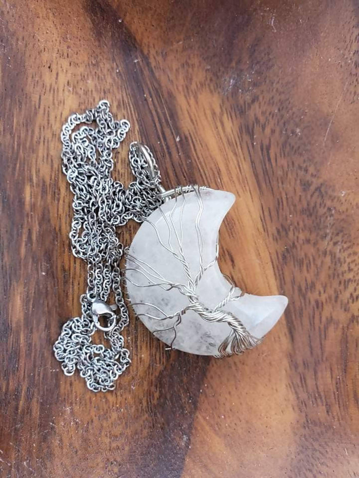 Wire wrapped clear quartz moon ?