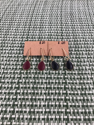 Gold tone and leather drop earrings