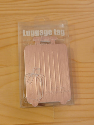 Luggage tags - 33rd St W